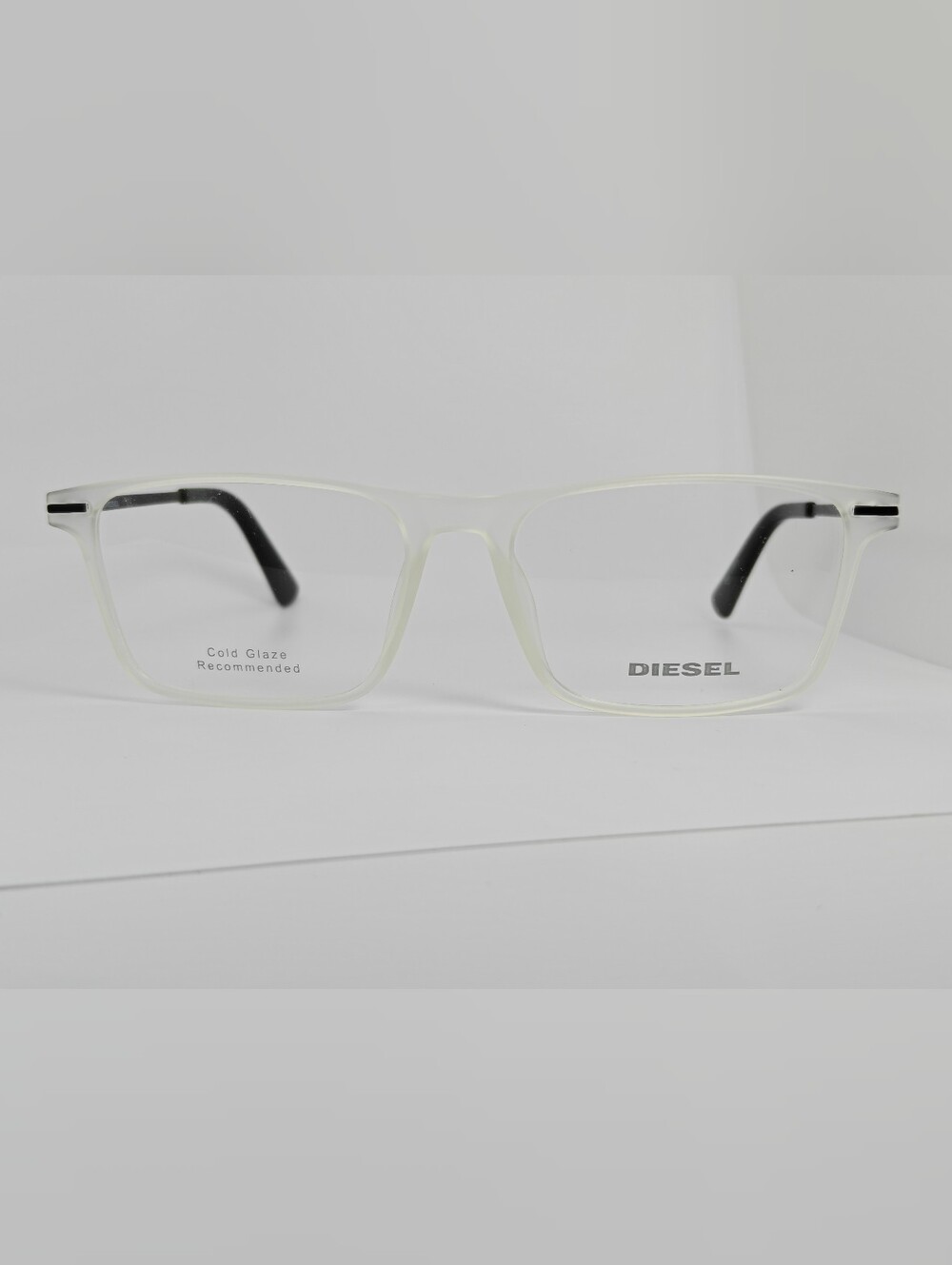 Diesel DL 53 Transparent Frame Eyeglasses with Black Temples.Orange Highlights.